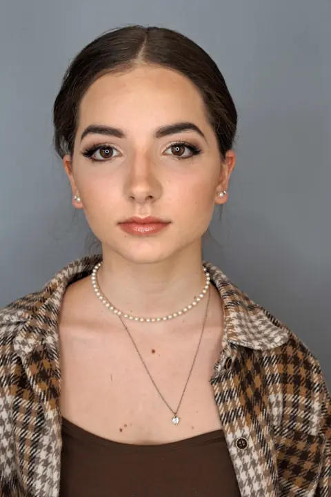 Girl posing with prom makeup