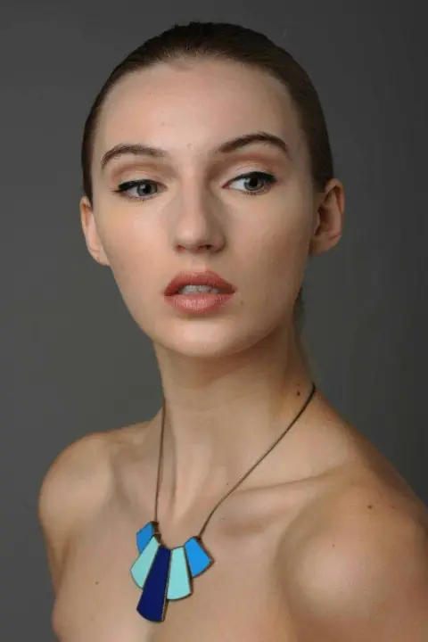 Model posing for a jewelry photoshoot