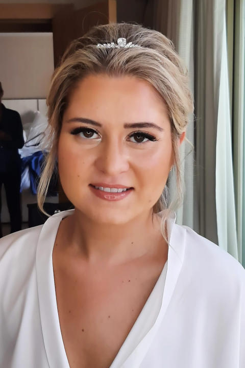 Bride posing with wedding makeup