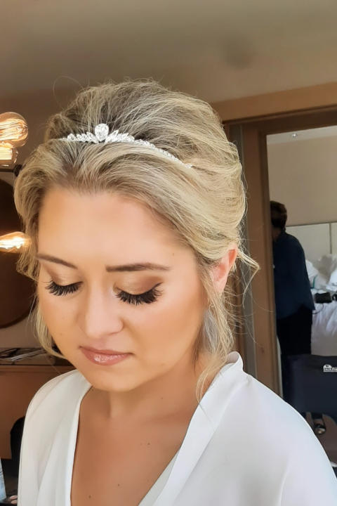 Bride posing with wedding makeup