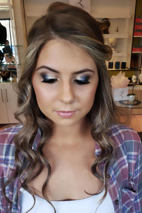 Girl posing with prom makeup
