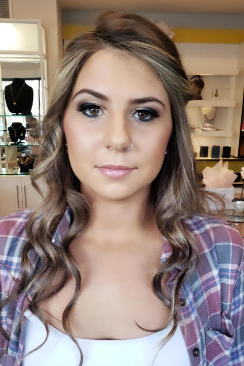 Girl posing with prom makeup